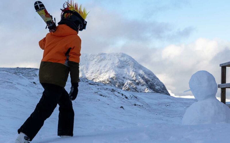 A-young-boy-carrying-his-skis-at-Glencoe-Mountain-Resort-(picture-by-Robert-Perry)